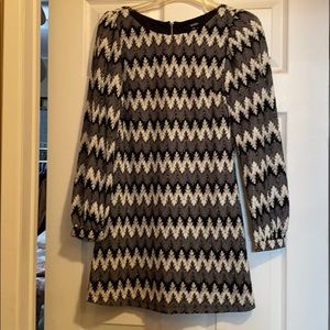 Black, white and silver lace zigzag mini dress